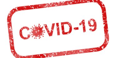 COVID-19 in roter Schrift mit roten Rahmen